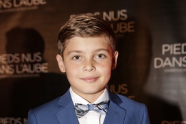 Sur le tapis rouge du film Pieds nus dans l'aube