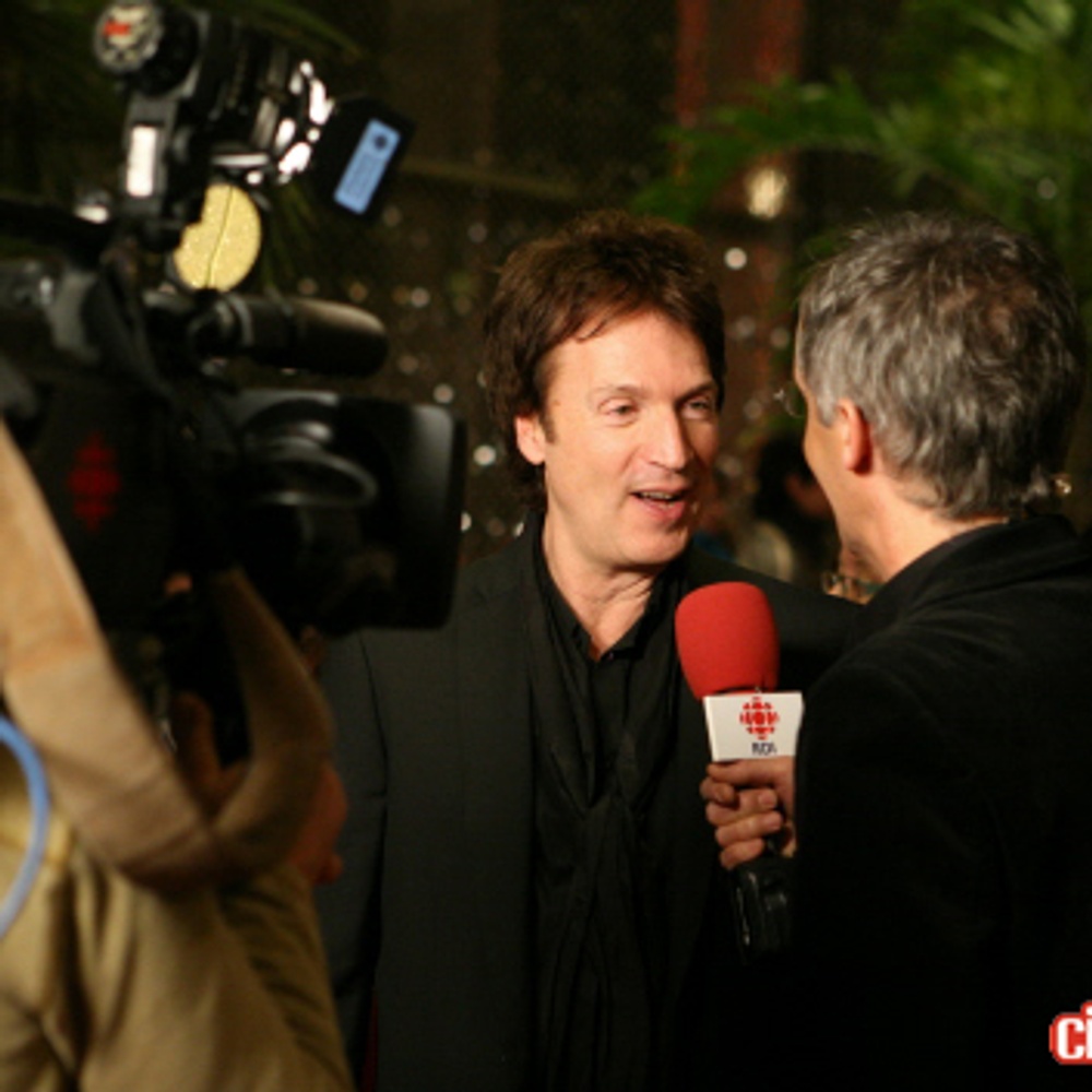 Claude Meunier sur le tapis rouge du film Le grand départ