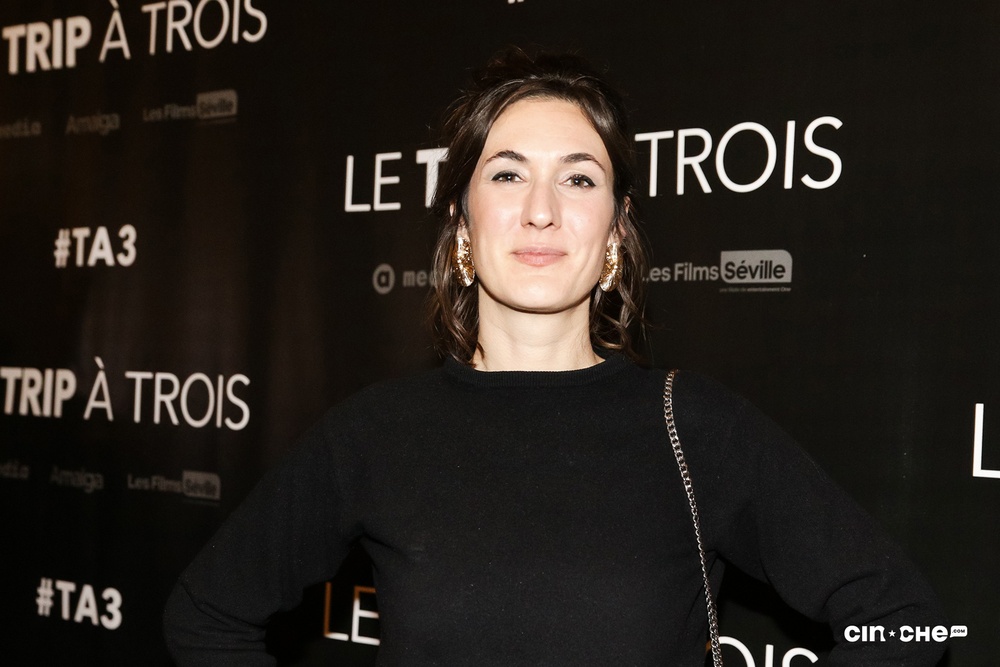 Sur le tapis rouge du film Le trip à trois